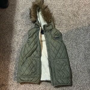 Mountaineering olive faux down vest. Excellent condition!